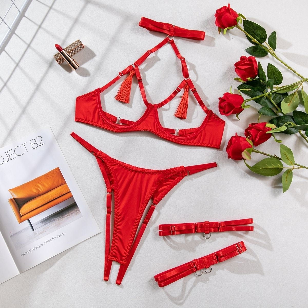Red satin tassel harness lingerie set - lifestyle detail shot